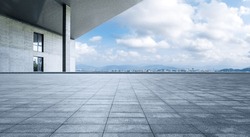 Empty Square Floor And City Skyline With Building Background