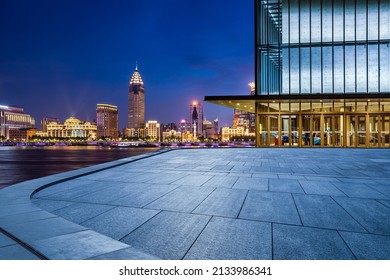 Empty Square Floor And City Skyline With Buildings In Shanghai At Night, China.