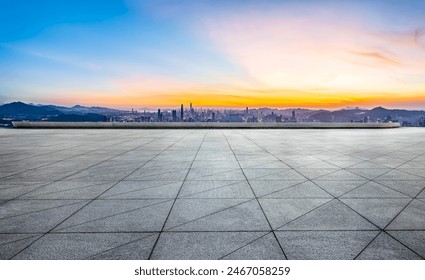 Empty square floor and city skyline with mountain scenery in Shenzhen - Powered by Shutterstock