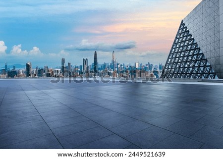 Similar – Image, Stock Photo Dusk in the city with chairs and table in front of a pub