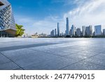 Empty square floor with modern city buildings scenery in Guangzhou. Road and buildings background.