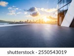 Empty square floor with modern city buildings scenery at sunrise in Shenzhen. Outdoor square background.