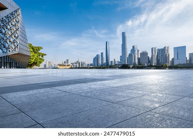 Empty square floor with modern city buildings scenery in Guangzhou. Road and buildings background.