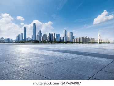 Empty square floor with modern city buildings scenery in Guangzhou. car advertising background. - Powered by Shutterstock