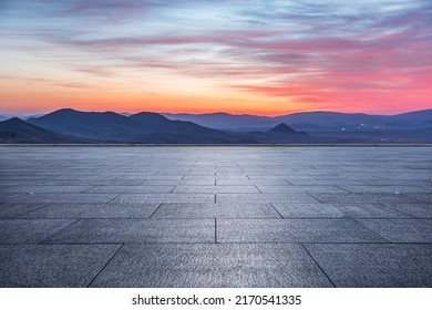 Empty square floor and mountain with sky cloud landscape at sunrise - Powered by Shutterstock