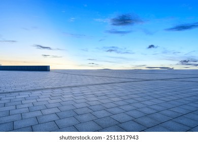Empty square floor with sky clouds background at dusk