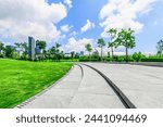 Empty square floor and trees with buildings in park