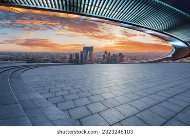 Empty square floors and city skyline with modern buildings at sunset in Suzhou, Jiangsu Province, China. high angle view. - Shutterstock ID 2323248103