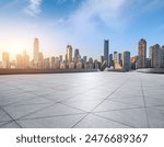 Empty square floors with modern city buildings scenery at sunrise in Chongqing