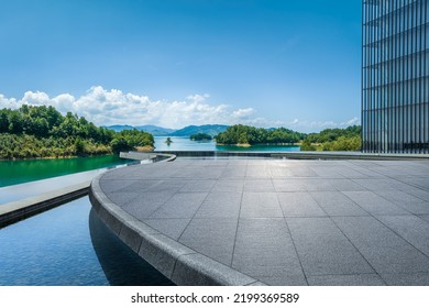 Empty square platform and green mountain with lake natural scenery