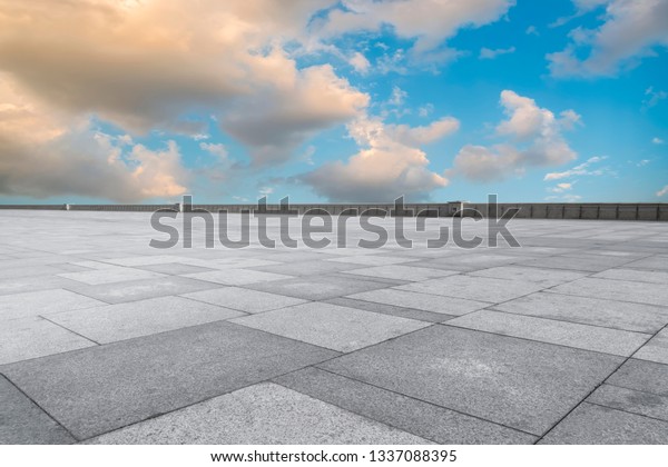 Empty square tiles
and beautiful sky scenery