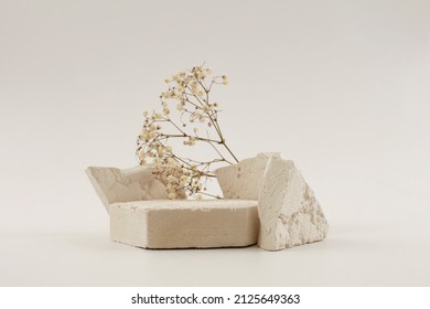 Empty stack of stones platform podium on beige background. Minimal empty display product presentation scene. - Shutterstock ID 2125649363