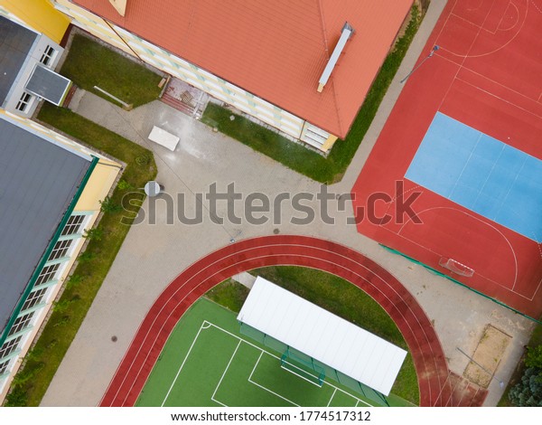 Empty stadium soccer\
field, top down view