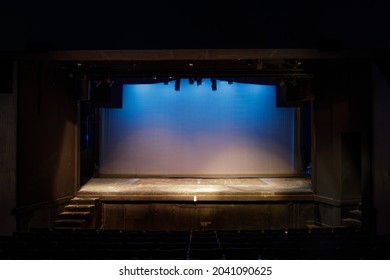 Empty Stage Lit In Blue And Yellow Lights On Cyclorama