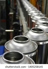 Empty Steel Aerosol Cans On Production Line In Factory