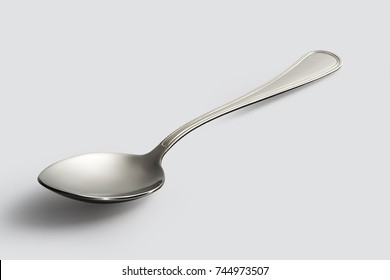 Empty steel Spoon isolated on white background - Shutterstock ID 744973507