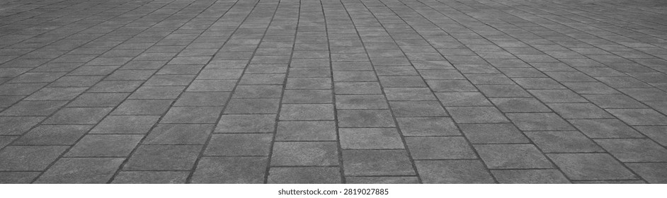 empty stone floor top in perspective. grey tile floor background in perspective view. line. empty copy space stone street. pavement. Granite outdoor tiled floor. gray granite. Marble texture