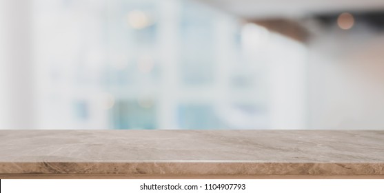 Empty stone table top on blurred with bokeh shopping mall background - can be used for display or montage your products - Shutterstock ID 1104907793