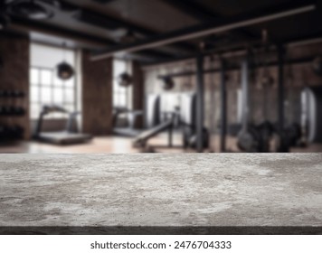 Empty stone table top on Exercise room background