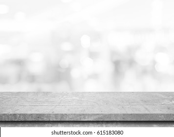 Empty Stone Table Top On Gray Blur Abstract Background From Inside Shopping Mall,Used For Display Or Montage Your Products.