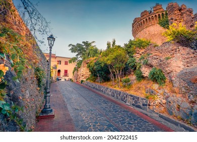 Empty street around Aragonese Belvedere Marittimo Castle. Colorful morning cityscape of Belvedere Marittimo town, Italy, Europe. Traveling concept background.