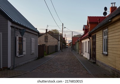 Empty Street (asphalt Road) Of A Small Town (village). Traditional And Modern Houses, Cottages. Tourism, Vacations, Home Office, Guest House, Real Estate Development, City Gardening, Lifestyle