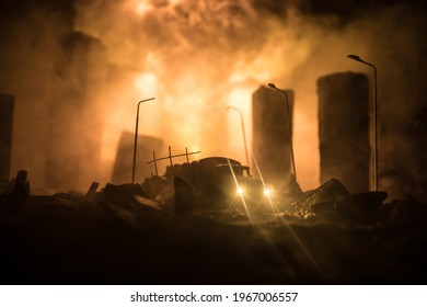 Empty Street Of Burnt Up City, Flames On The Ground And Blasts With Smoke In The Distance. Apocalyptic View Of City Downtown As Disaster Film Poster Concept. Night Scene. City Destroyed By War.