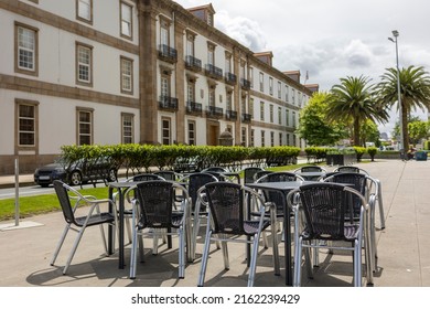 An Empty Street Cafe On A Sunny Day.