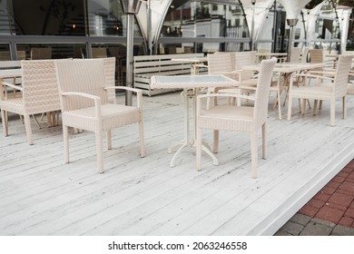 Empty Street Cafe With Tables. No People