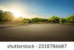 Empty street garden at and tarmac floor. sunrise.