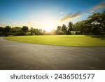 Empty street at the nice and beautyful garden during the sunrise.