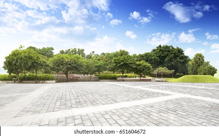 Empty Street At The Nice And Comfortable Garden Background With Nice Blue Sky