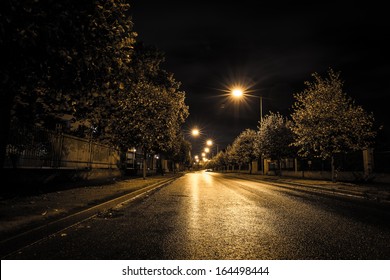 Empty Street At Night In An Estate