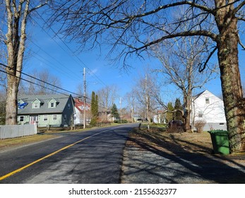 An Empty Street In A Rural Neighborhood. 