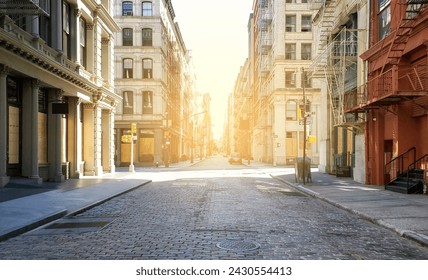 Empty streets and sidewalks of Soho are eerily quiet during the 2020 coronavirus pandemic lockdown in New York City at sunset with no people  - Powered by Shutterstock