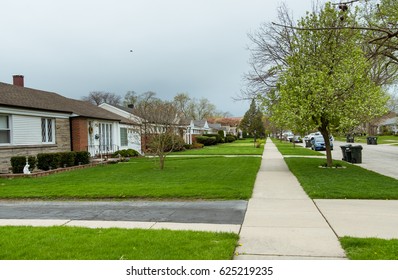 Empty Suburban Street And Sidewalk