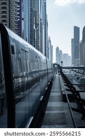 Empty subway platform with modern train waiting at station in dubai