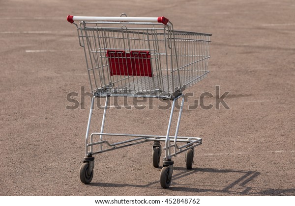 Empty supermarket shopping\
cart