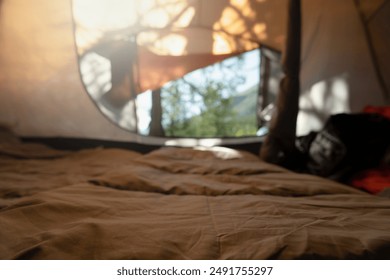 empty surface of sleeping bag in the camping tent - Powered by Shutterstock