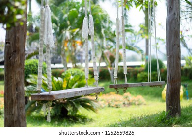 Empty swing in the park selective focus.