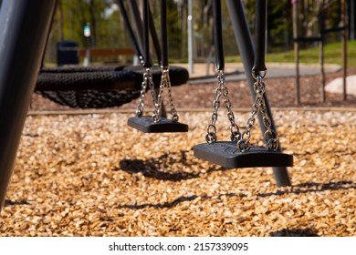 Empty Swing Set At Playground