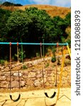 An empty swing waiting to be occupied by some couple overlooking the beautiful gorges of the Cherapunji in the Indian state of Meghalaya
