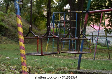empty swings on the playground - Shutterstock ID 741556369