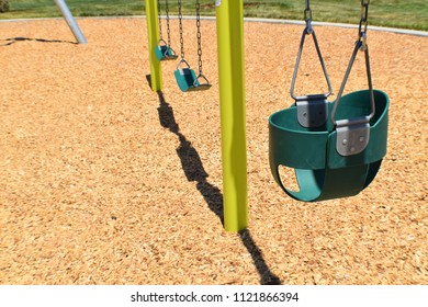 Empty Swingset In Park