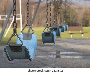 Empty swingset in a park.