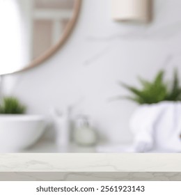 Empty table in bathroom, blurred background. Space for design