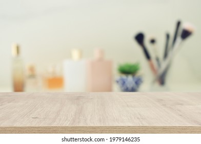 empty table board and defocused vintage woman toilet desk background. product display concept