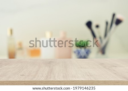 empty table board and defocused vintage woman toilet desk background. product display concept
