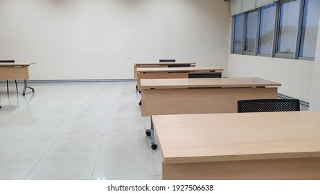 Empty table and chair in the classroom at school