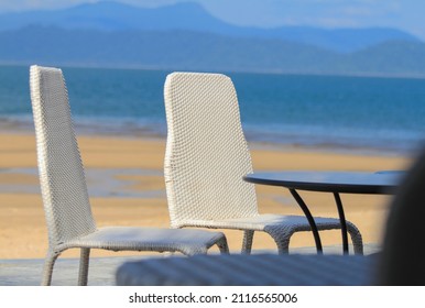 Empty Table and chair on the beach and sea background Ranong Province, Thailand